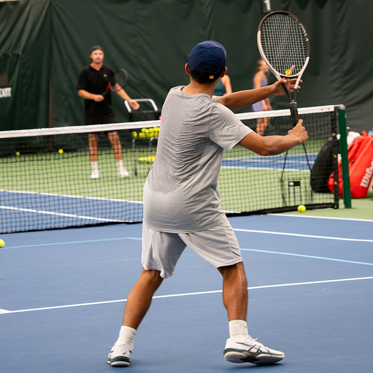 MVP Athletic Clubs, Boys Indoor Tennis, High School boy playing tennis indoors