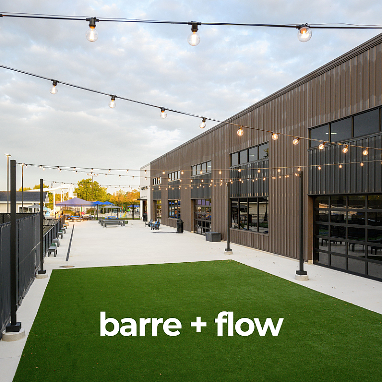MVP Crahen, Green turf with text overlay Barre Flow