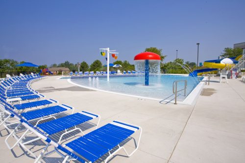 MVP Holland, Outdoor Pool, Water fountain, slide, chairs by pool