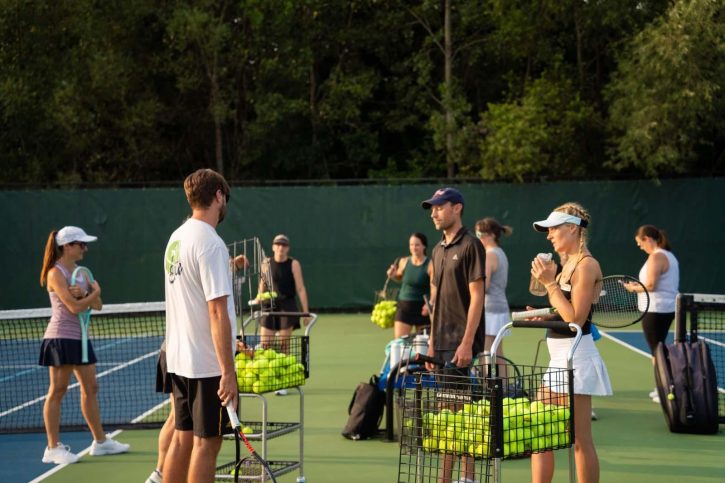 MVP Tennis outdoor, adults gathered on court